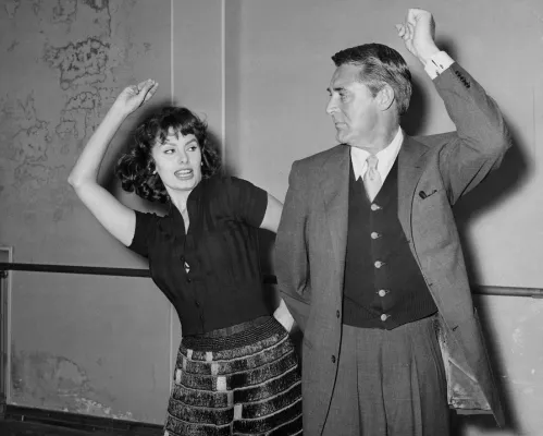Sophia Loren and Cary Grant pretending to dance flamenco in 1957