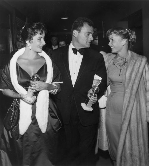 Elizabeth Taylor, Mike Todd, and Debbie Reynolds at the Hollywood Foreign Press Association Awards Dinner in 1957