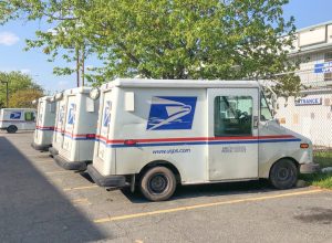 Mclean, Va, USA - May, 15, 2020 USPS car trucks on the parking lot. Postal Workers American Heroes concept.