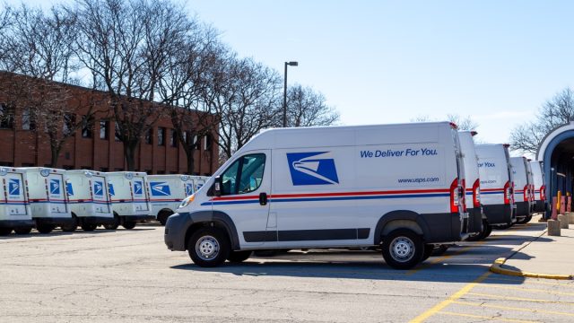Delivery Vehicles are shown in Oak Brook, Illinois, USA. USPS is an independent agency of the executive branch of the United States federal government.