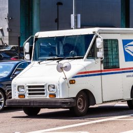 Aug 10, 2019 San Francisco / CA / USA - USPS vehicle making deliveries in San Francisco
