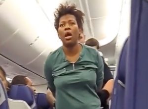 Woman Tried to Open Airplane Door at 37,000 Feet and Bit the Passenger Who Tried to Stop Her on Flight