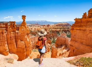A woman looking at a vista in Bryce Canyon National Park during a hike