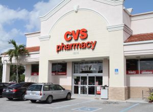 "West Palm Beach, USA - July 27, 2012: A CVS Drugstore Pharmacy store with cars parked in the front parking lot. CVS is one of the largest drugstore chains in the USA."
