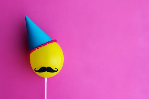 balloon with a mustache and party hat
