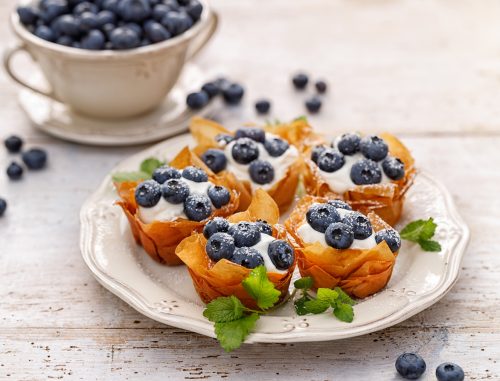 Phyllo cups with Mascarpone cheese filling topped with fresh blueberries 