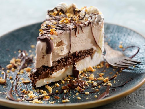 cookie Dough Ice Cream Cake with Chocolate Sauce and Crushed Almonds