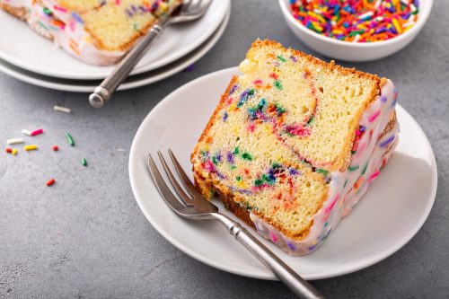 funfetti cake on white plate