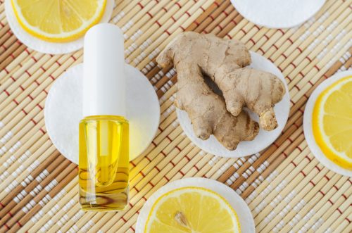 Small bottle with essential ginger oil 