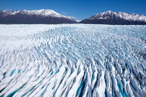 The blue and white ice of the Knik Glacier in Alaska.