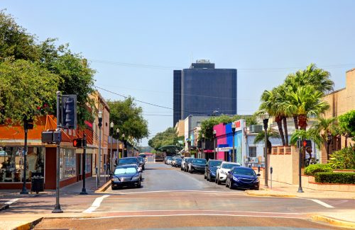 Looking down a downtown street on a sunny day in McAllen, Texas.