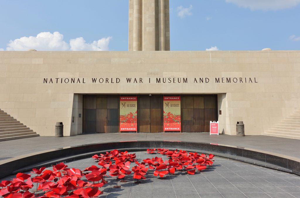 The entrance to the World War I Museum and Memorial with red poppies in a fountain