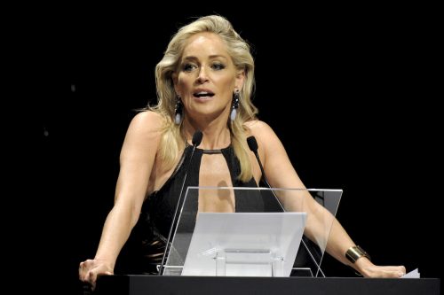 Actress Sharon Stone, charity auctioneer for AmFar, the Foundation for AIDS Research, during Fashion Week in Milan in 2012