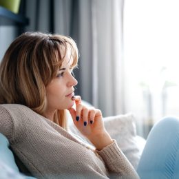 woman deep in thought reminiscing