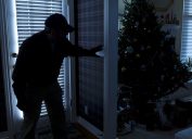 thief breaking in during the holidays