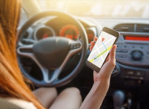 woman using driving navigation app