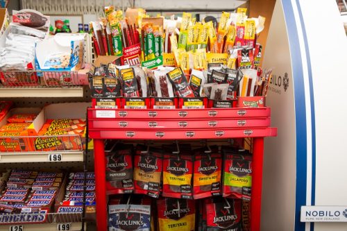 A view of a beef jerky display, seen at a local convenient store, featuring the brand Jack Links.