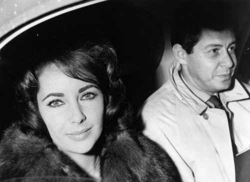 Elizabeth Taylor and Eddie Fisher in a car circa 1960