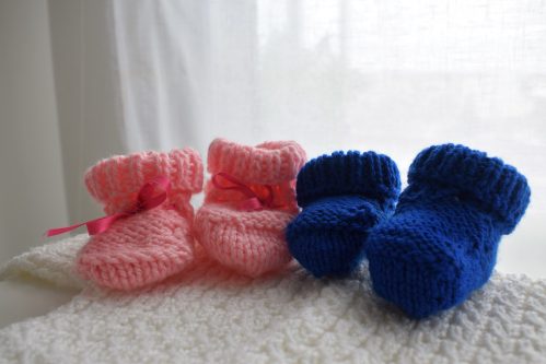 blue booties and pink booties for newborn babies