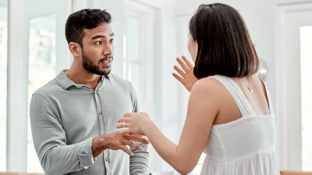 Shot of a young couple having an argument at home