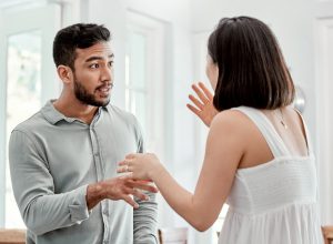 Shot of a young couple having an argument at home
