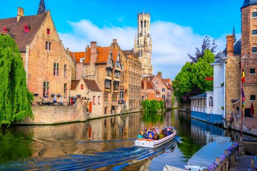 Classic view of the historic city center with canal in Brugge (Bruges), West Flanders province, Belgium. Cityscape of Bruges.