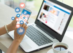 Woman on her phone looking at social media.