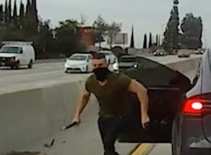 Wild Moment Enraged Tesla Driver Smashes Cars With Metal Pipe in Road Rage Rampage