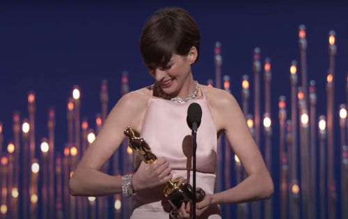 Anne Hathaway accepting her Oscar in 2013