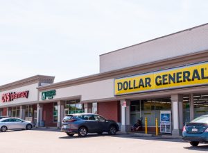 The Dollar General and CVS Pharmacy stores in the Swissvale Shopping center on a sunny summer day