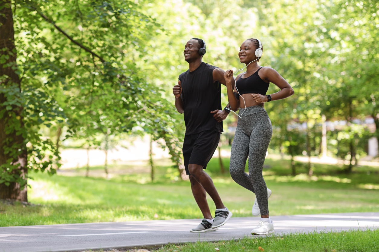 Couple on a morning jog outdoors. 