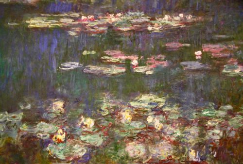 Closeup photo of a section of the Impressionist painter Claude Monet's Waterlily paintings in the Musee de l'Orangerie in Paris