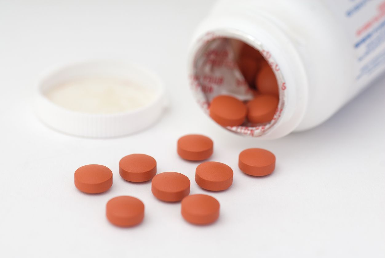 Closeup of ibuprofen tablets.