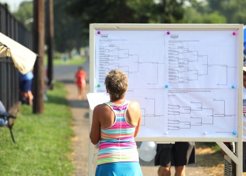 pickleball competitor looking at tournament bracket