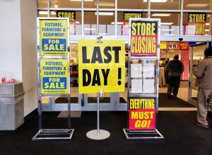 closing signs outside jcpenney store