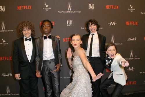 Gaten Matarazzo, Caleb McLaughlin, Millie Bobby Brown, Finn Wolfhard, and Noah Schnapp at a Golden Globes afterparty in 2017