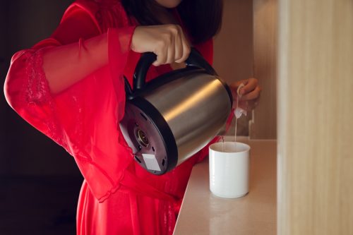 woman making tea