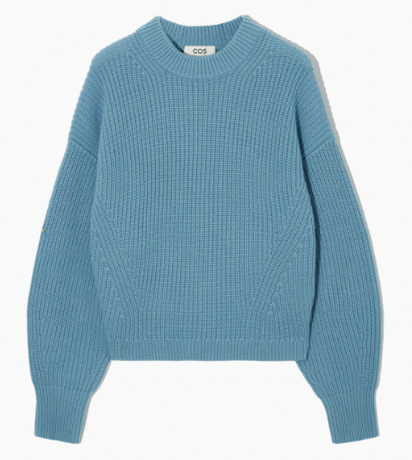 Product shot of a COS ribbed cashmere blend sweater in light blue