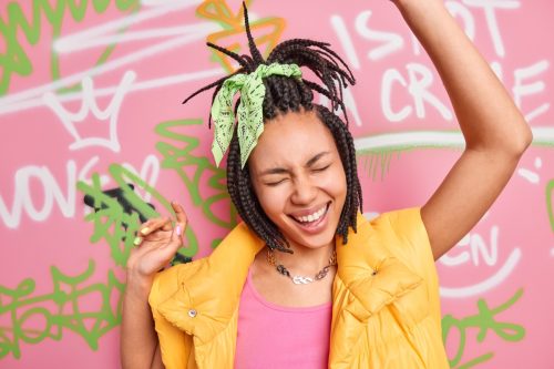 woman dancing happy and upbeat 