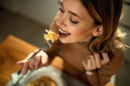 Young Woman Enjoying her Food