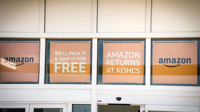 Kohl's store with amazon dropoff signs in window