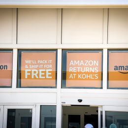 Kohl's store with amazon dropoff signs in window