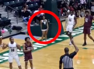 Cheerleader Is Ejected From Basketball Game After Shoving Player Who Got in Her Way