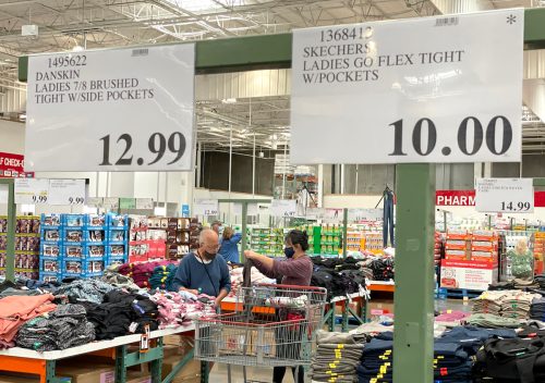Close up of price signs in the Costco clothing department