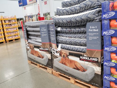 A display of Kirkland-branded dog beds at Costco