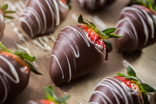 Chocolate covered strawberries with milk chocolate and white chocolate