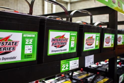 Interstate Batteries on shelves inside Costco
