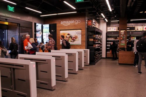 customers inside amazon go convenience store