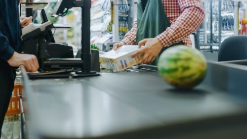 scanning items at supermarket