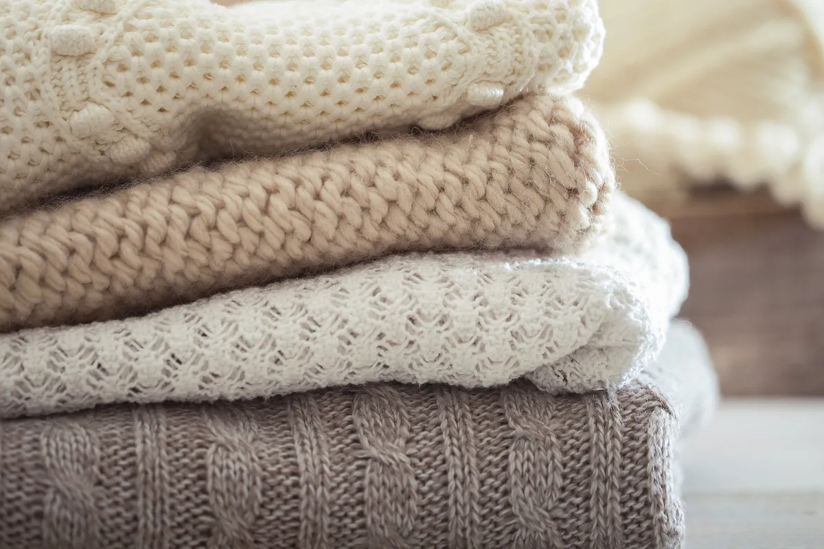 stack of sweaters | MercerOnline
